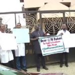 Pharmacists protest, ask president Buhari to sign Pharmacy bill into law