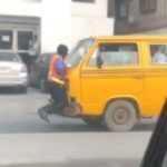 VIDEO: Lagos Danfo Driver Speeds Off With Bribe-Seeking Policewoman Clinged To His Bonnet