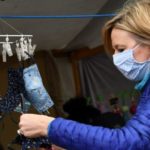 Coronavirus: Germans don compulsory masks as lockdown eases