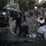 PHOTOS: Belgrade protest over COVID-19 curfew turns violent