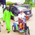 After 29 years of crawling, polio victim begins new life with mobility cart