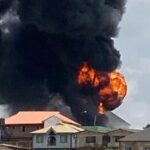 Pandemonium In Ogba As Petrol Station Catches Fire As Another Building Collapses [VIDEO]