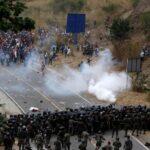 Guatemalan Forces Clash With Migrant Caravan, Biden Team Seeks to Halt Exodus (photos)