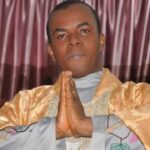 Buhari: We Will Expose You – APC Threatens Father Mbaka